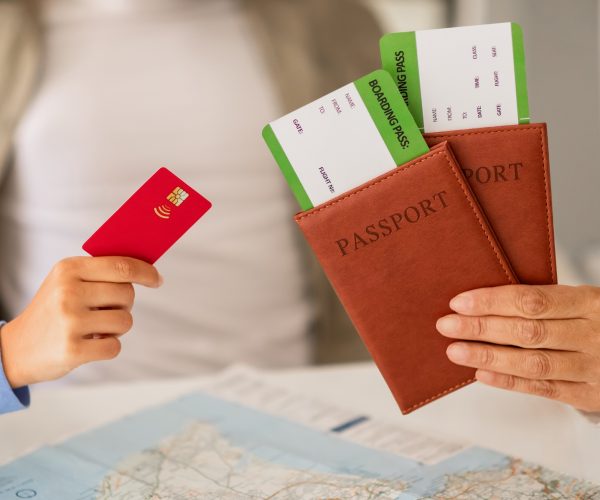 Unrecognizable couple meeting with a travel agent or visa manager